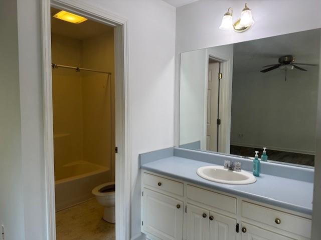 539 Faulkner Street Cleveland, GA 30528 - Photo 24 of 25 a bathroom with a granite countertop sink toilet and shower