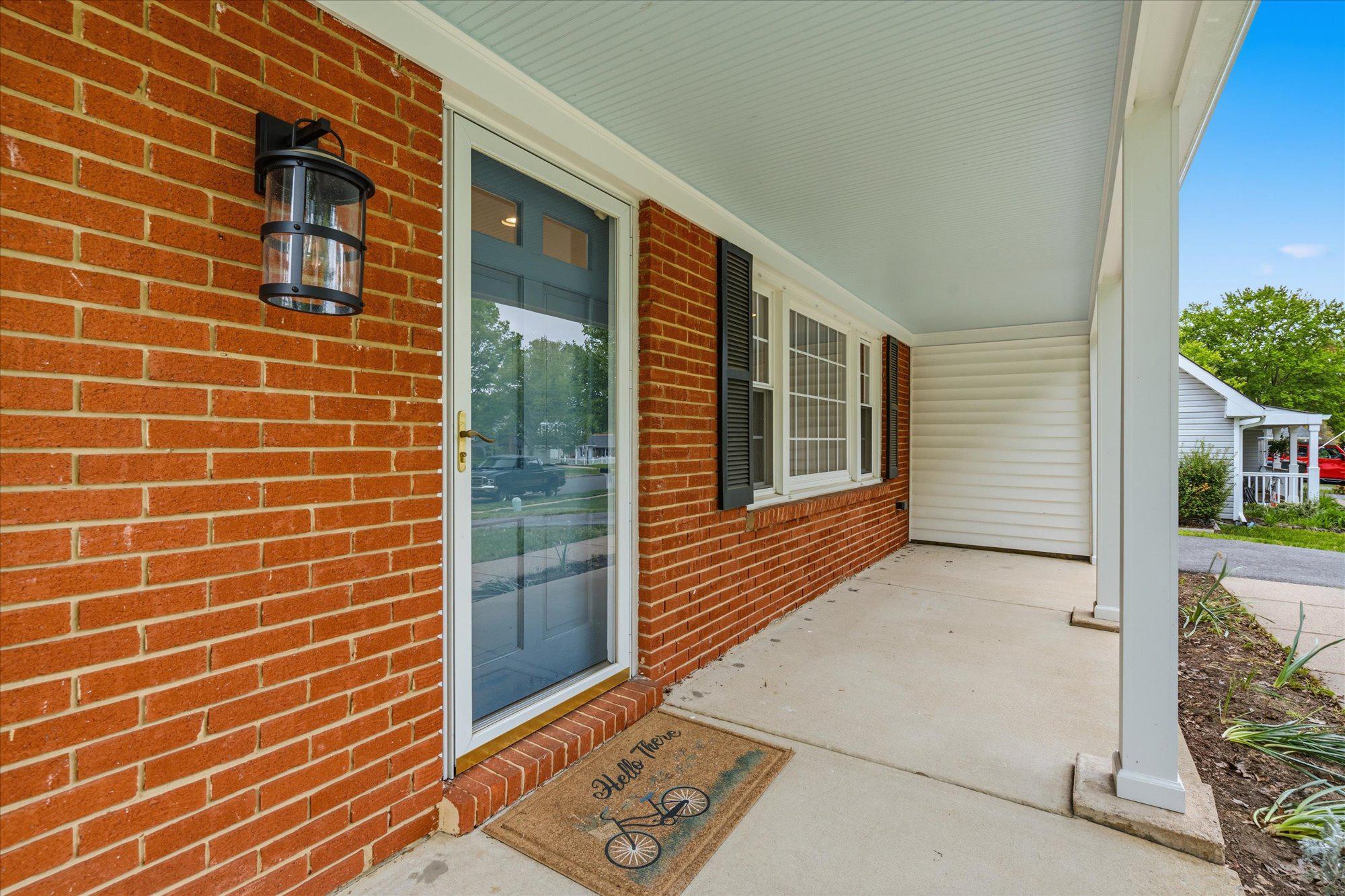 5406 Dunsmore Road Alexandria, VA 22315 - Photo 3 of 31 Charming porch entryway with classic brick front.
