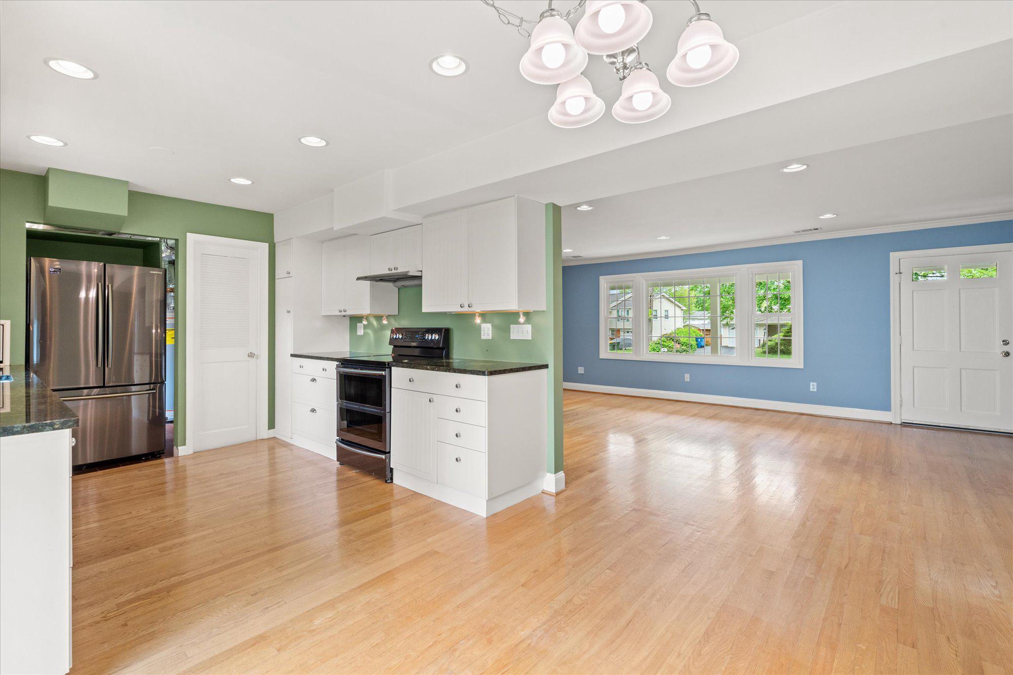 5406 Dunsmore Road Alexandria, VA 22315 - Photo 6 of 31 Open-concept ties kitchen & dining rm to liv rm.