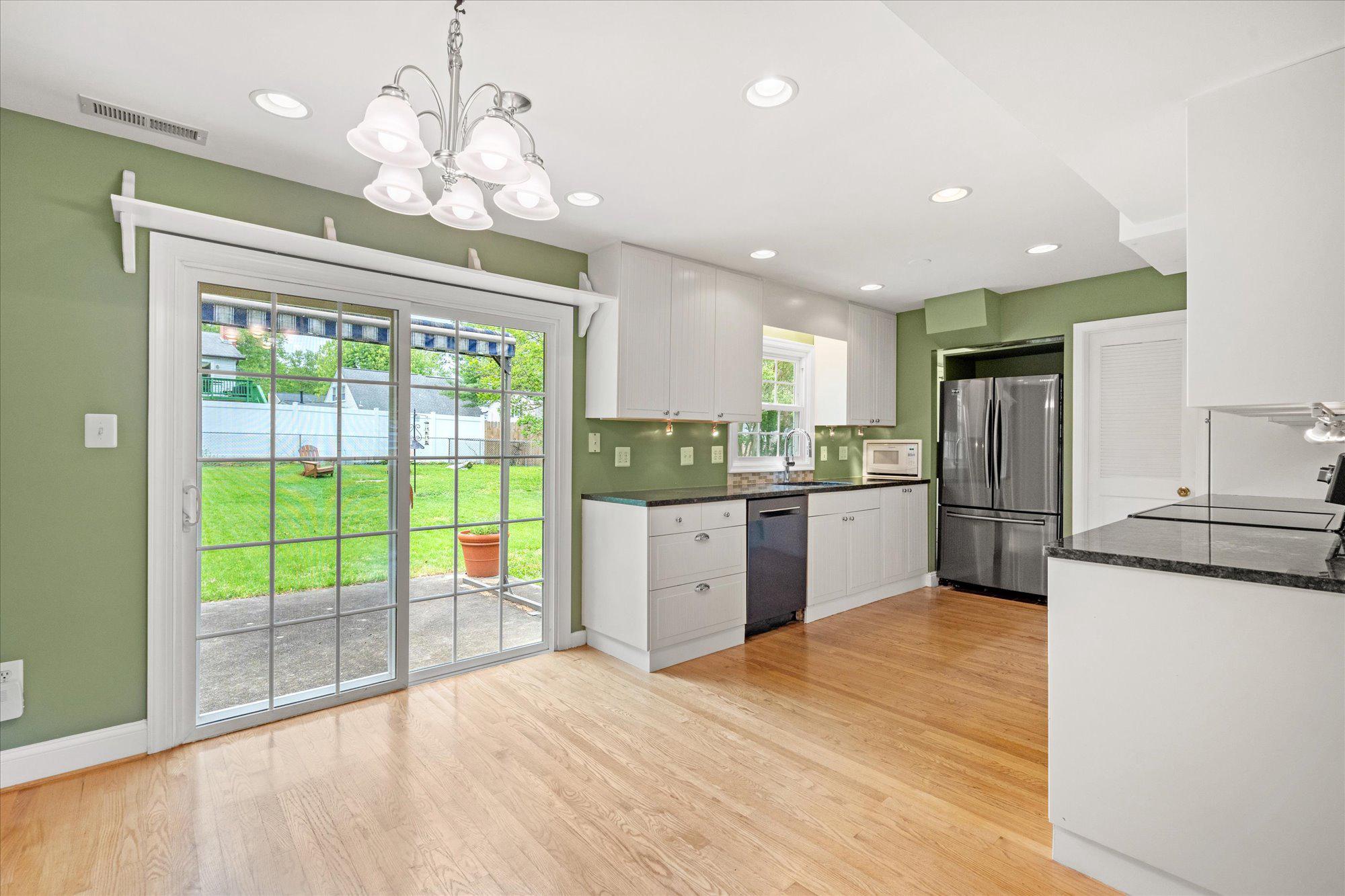 5406 Dunsmore Road Alexandria, VA 22315 - Photo 8 of 31 Bright kitchen & dining room with garden views.