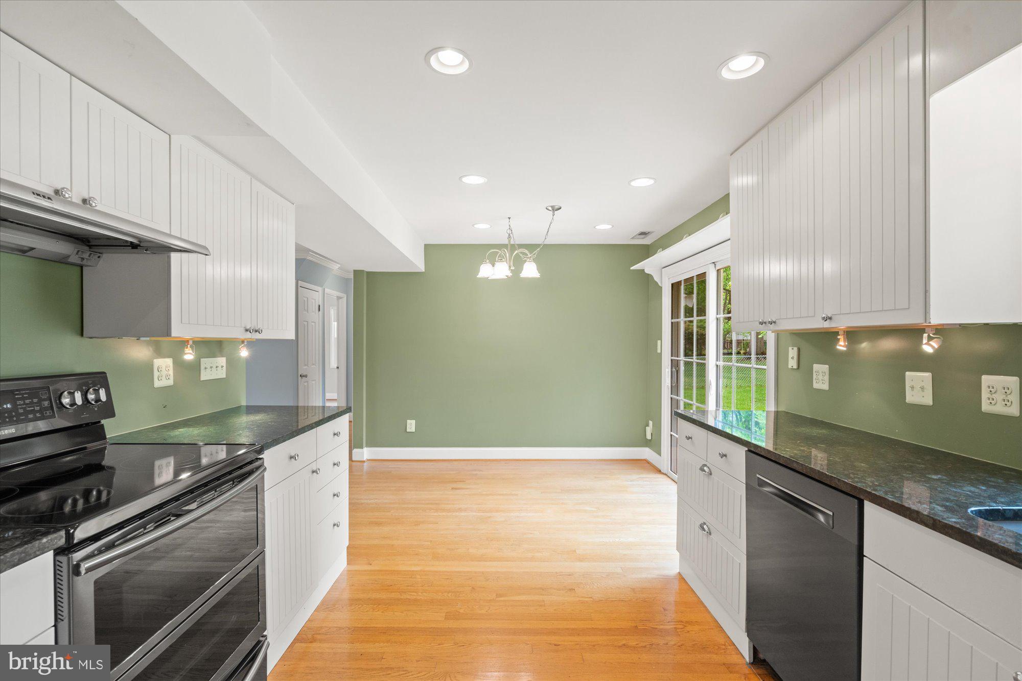 5406 Dunsmore Road Alexandria, VA 22315 - Photo 9 of 31 Modern kitchen with vibrant accents.