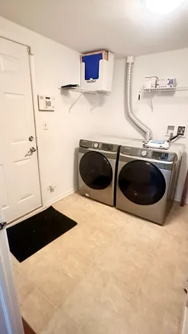 a kitchen with a sink and a stove