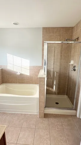 a bathroom with a bath tub