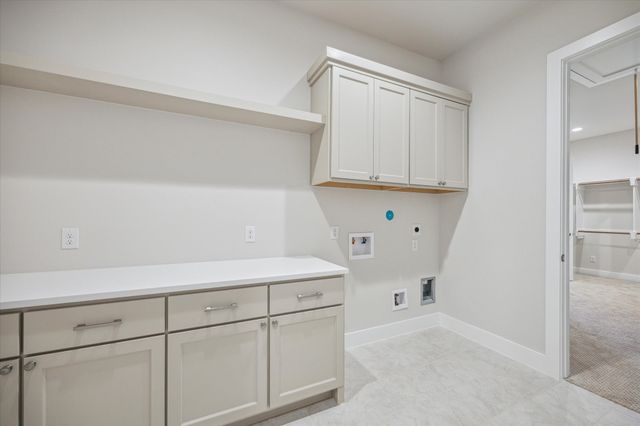 a view of room with cabinets