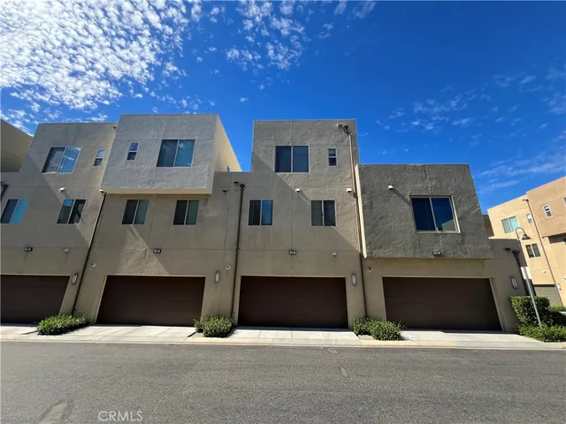 a front view of a house with yard