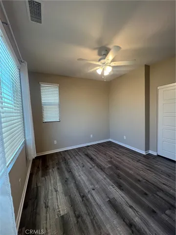 a bathroom with a toilet a sink and shower