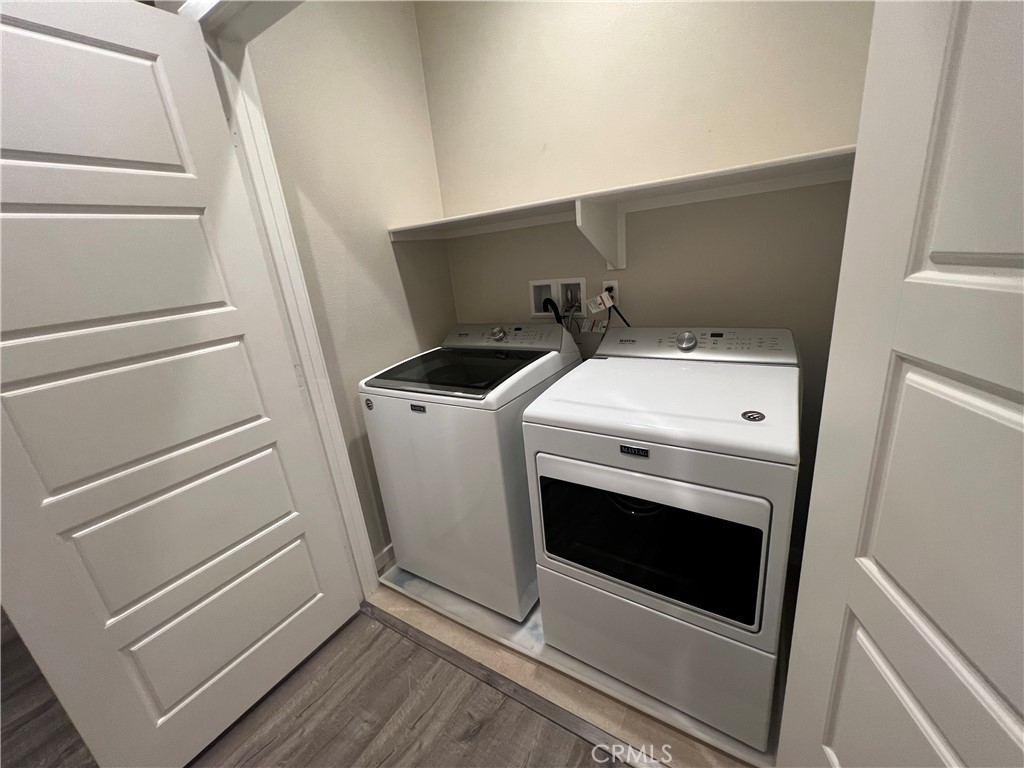 177 Magnet Irvine, CA 92618 - Photo 16 of 37 a utility room with dryer and washer