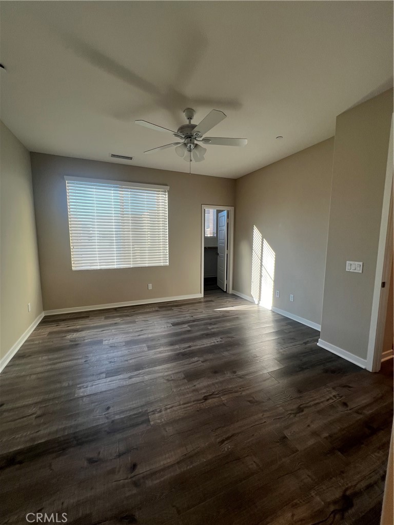 177 Magnet Irvine, CA 92618 - Photo 17 of 37 an empty room with wooden floor and windows