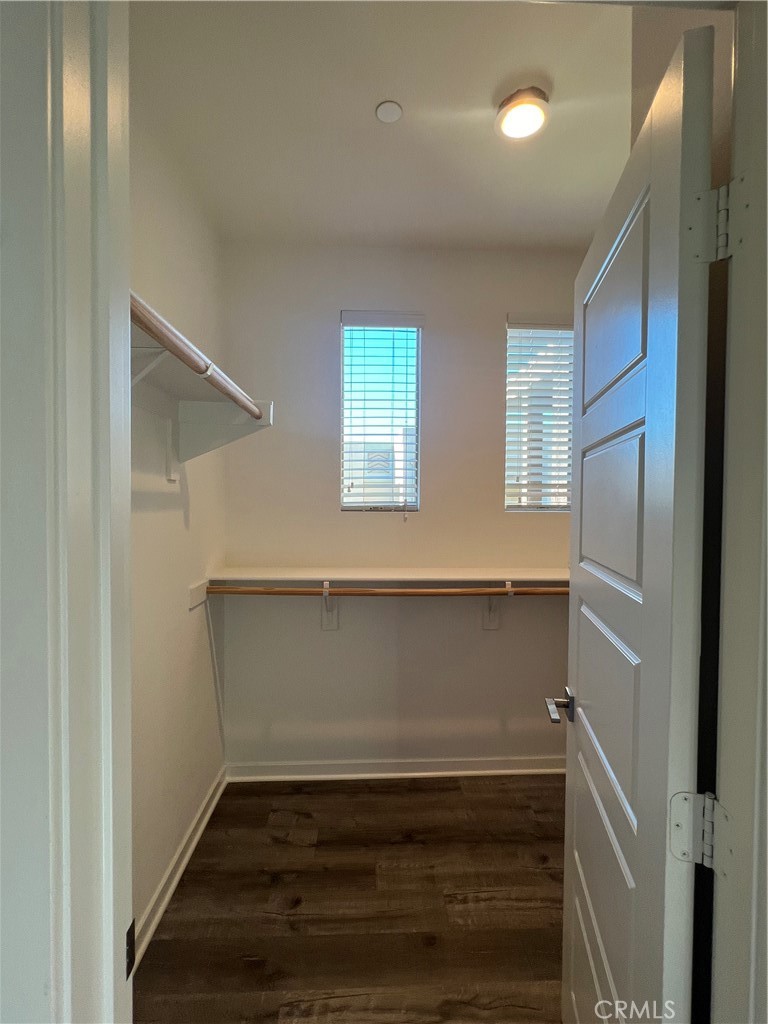 177 Magnet Irvine, CA 92618 - Photo 18 of 37 a view of storage and utility room with wooden floor and window