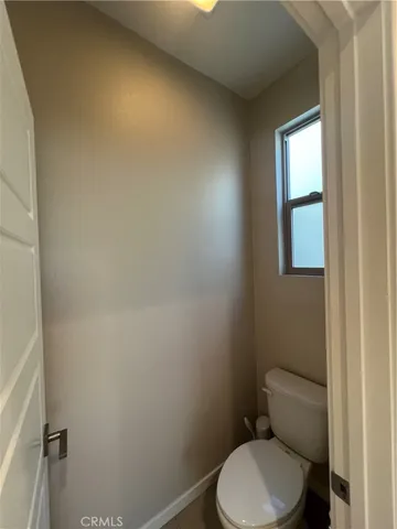 a bathroom with a mirror a double vanity sink and mirror