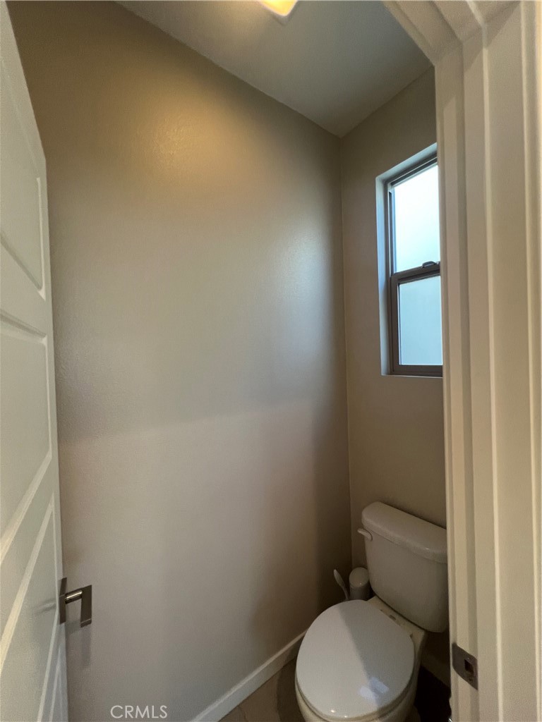 177 Magnet Irvine, CA 92618 - Photo 20 of 37 a white toilet sitting next to a window