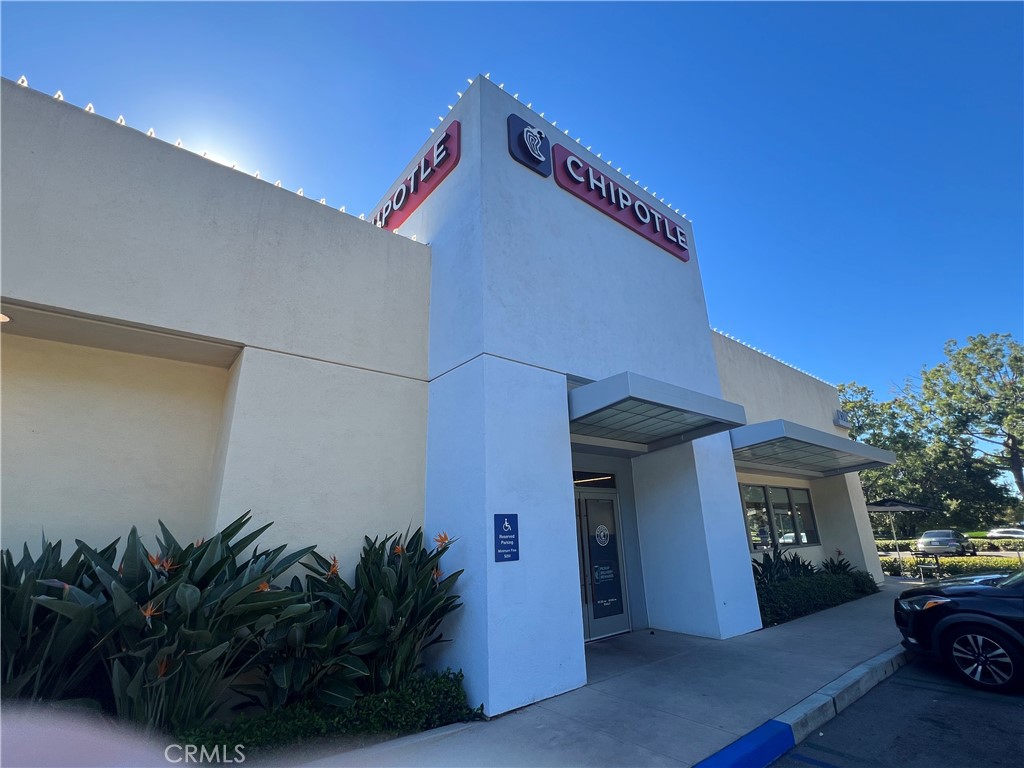 177 Magnet Irvine, CA 92618 - Photo 31 of 37 a building with potted plants in front of it