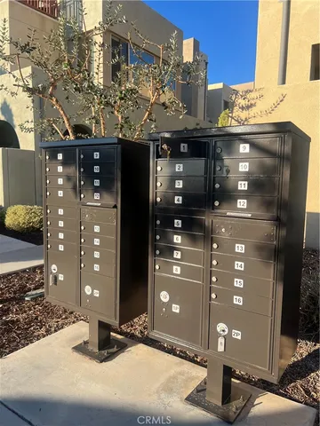 a kitchen with stainless steel appliances granite countertop a sink and a refrigerator