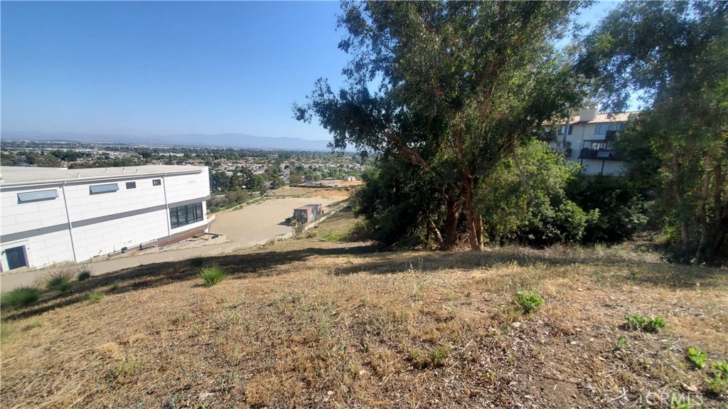 8091 Camino Predera Rancho Cucamonga, CA 91730 - Photo 1 of 8 a view of a yard with a house