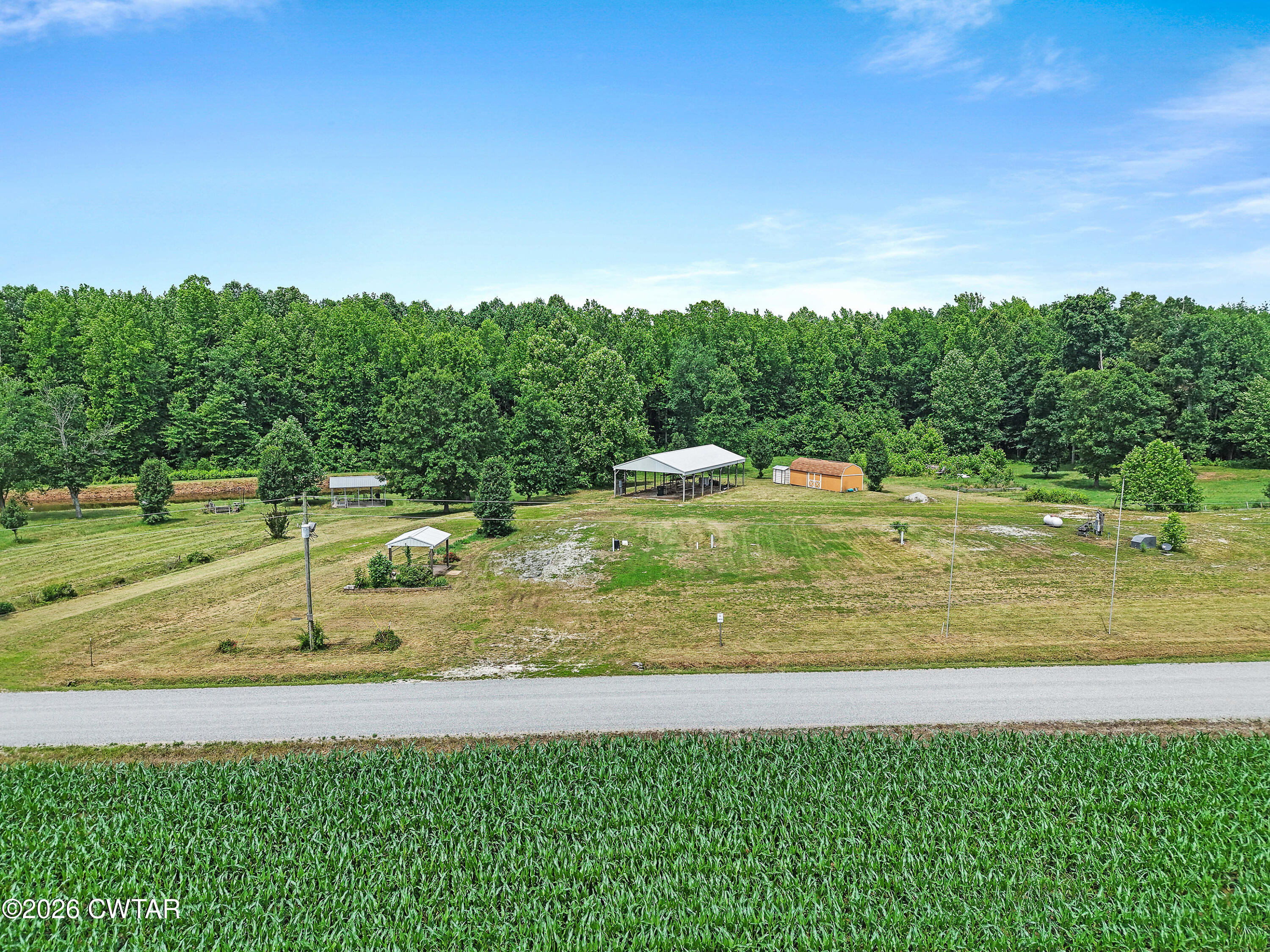 375 Adams Road Henry, TN 38231 - Photo 1 of 21 DJI_20260528114659_0973_D
