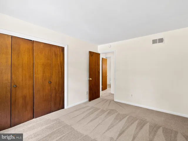 a view of a room with an entryway