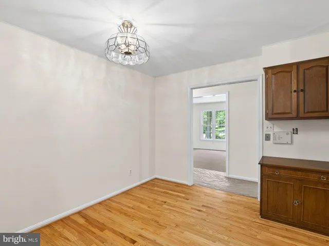 a kitchen with stainless steel appliances a sink stove and microwave
