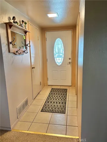 a room with furniture and a fireplace