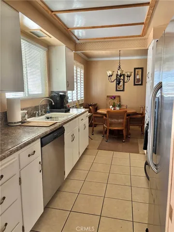 a shelf with cup and plates