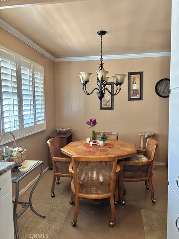 a spacious bathroom with a granite countertop sink and a mirror