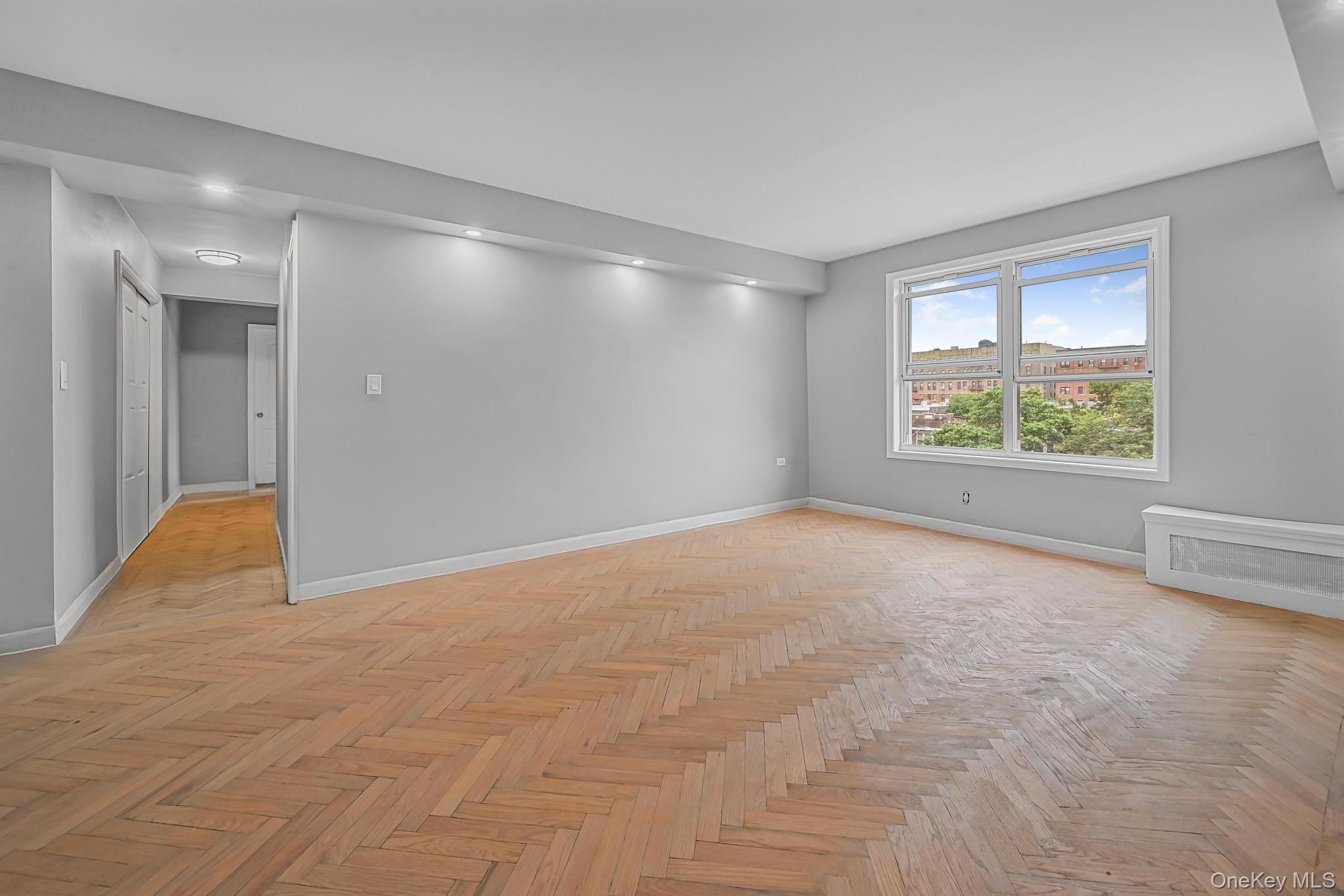 160 72nd Street, Unit 758 Brooklyn, NY 11209 - Photo 5 of 10 a view of an empty room with a window