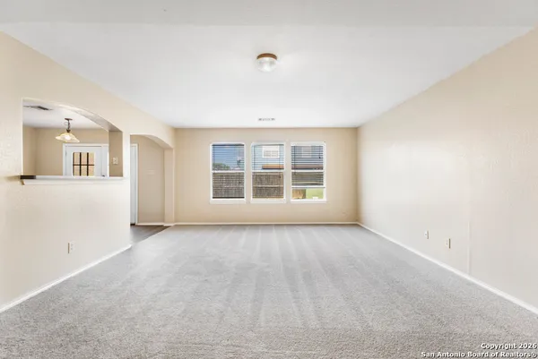 an empty room with windows