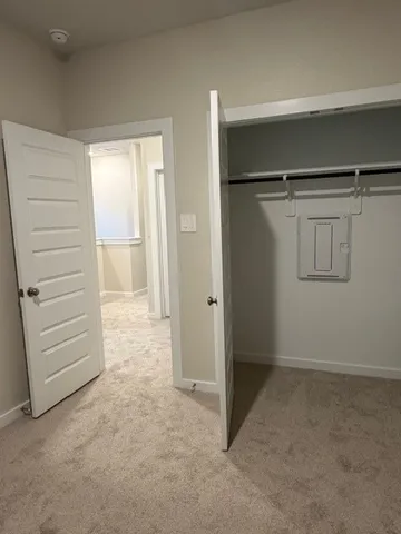 a view of an empty walk in closet