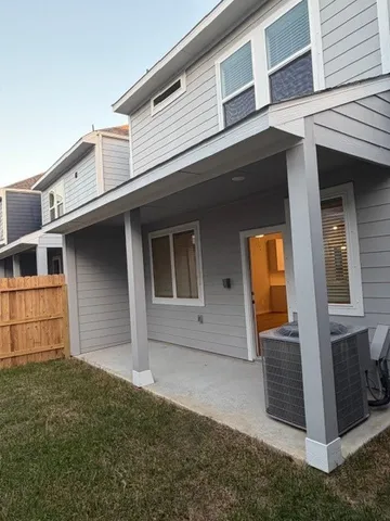 a view of house with yard