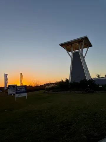 a view of a patio with chairs and a table