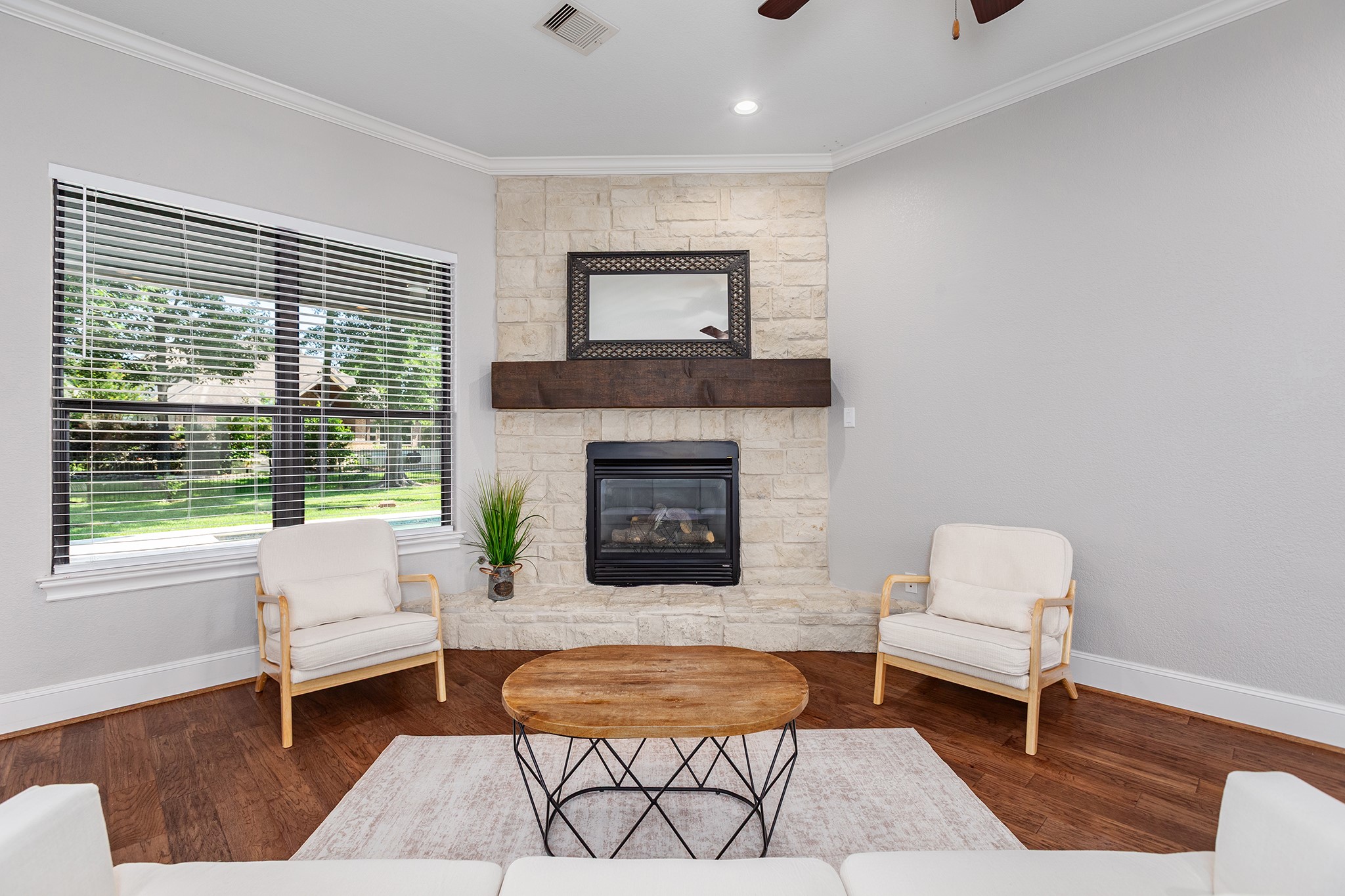 5507 Bright Timber Landing Drive Spring, TX 77386 - Photo 12 of 45 Gas log fireplace with timeless limestone