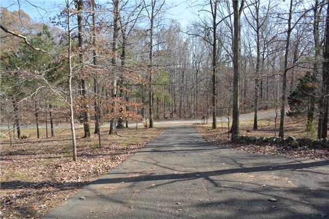 180 Taylor Road Dickson, TN 37055 - Photo 9 of 20 Paved drive leading to both the house and the shop behind the house.