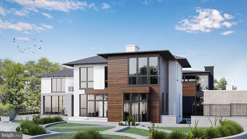 681 B Chain Bridge Road McLean, VA 22101 - Photo 10 of 16 a front view of a house with a yard