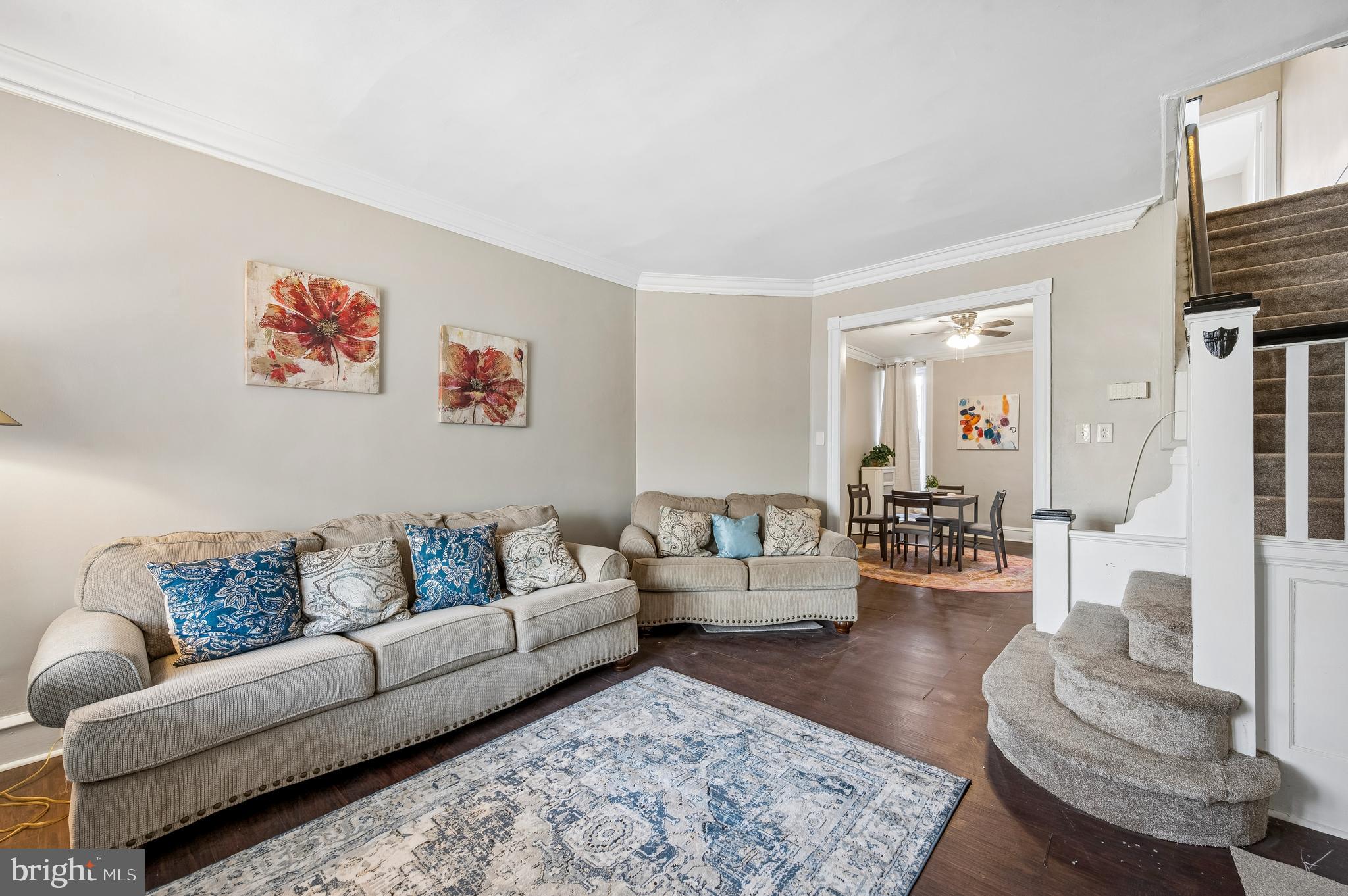 5428 Whitby Avenue Philadelphia, PA 19143 - Photo 2 of 15 a living room with furniture or couch and a couch