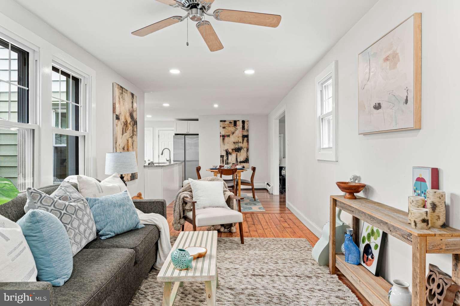 209 Willow Road Wallingford, PA 19086 - Photo 13 of 25 a living room with furniture and a baby crib