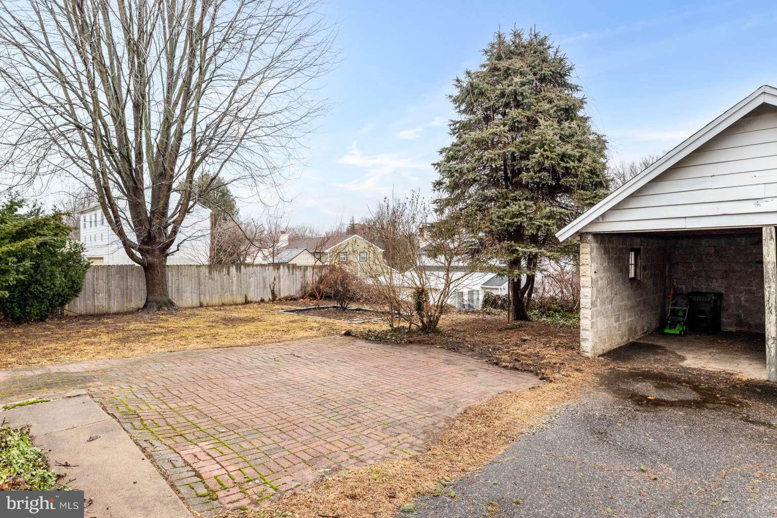 209 Willow Road Wallingford, PA 19086 - Photo 25 of 25 a view of a house with a snow in the yard