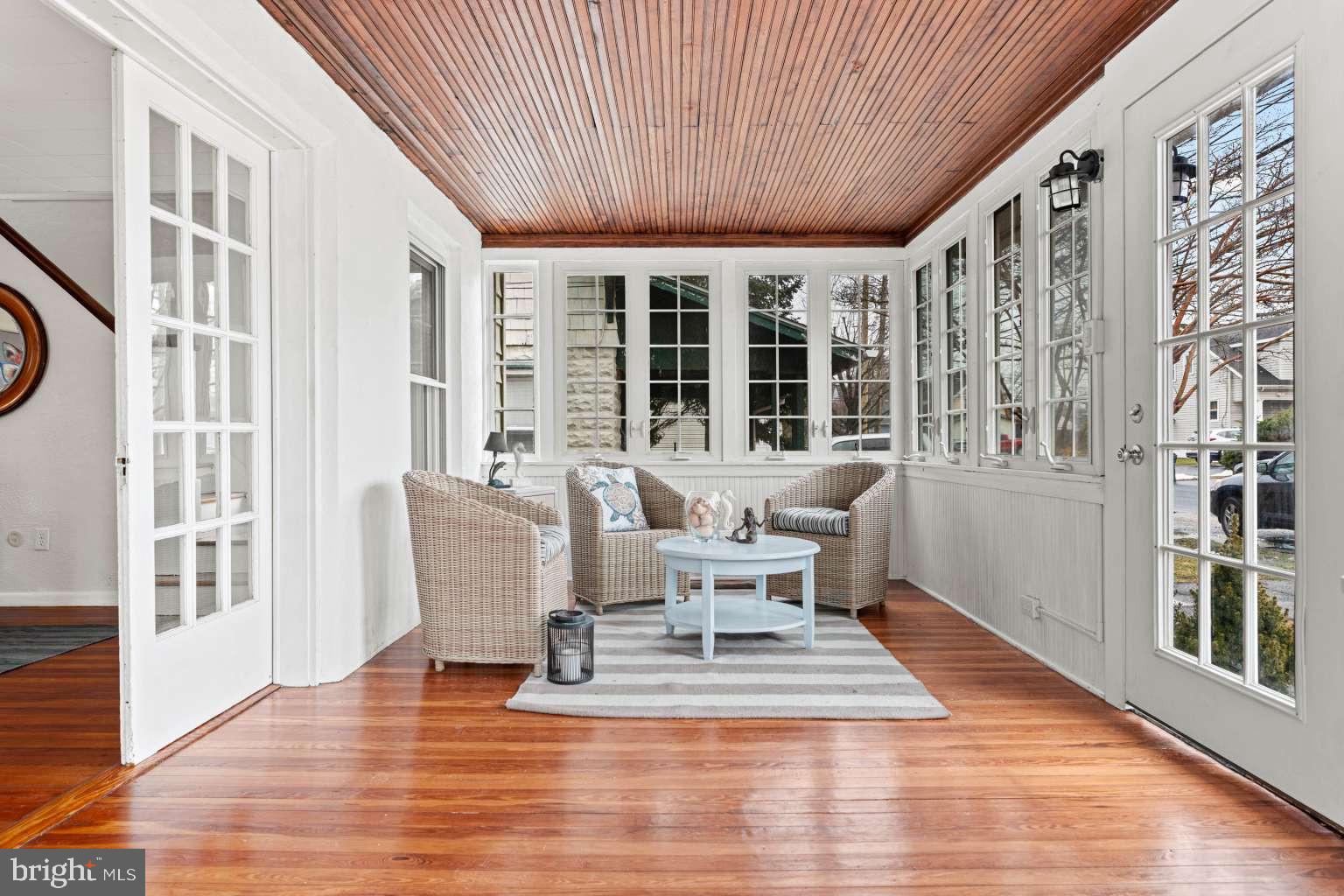209 Willow Road Wallingford, PA 19086 - Photo 4 of 25 a dining room with wooden floor table and chairs