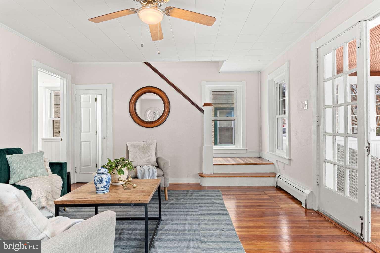 209 Willow Road Wallingford, PA 19086 - Photo 6 of 25 a view of a livingroom with furniture and a table