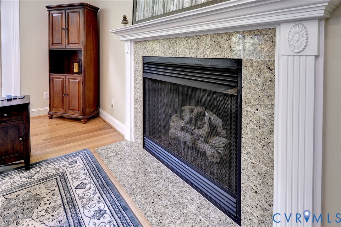 4015 Cold Spring Road Williamsburg, VA 23188 - Photo 11 of 57 Fireplace featuring a stone surround, white mantel