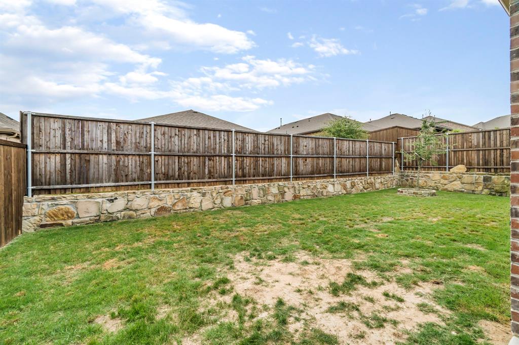 3610 Bastrop Street Melissa, TX 75454 - Photo 23 of 23 a view of a backyard with a garden and stairs