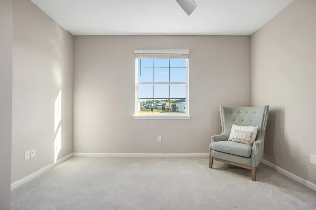 a living room with furniture and window