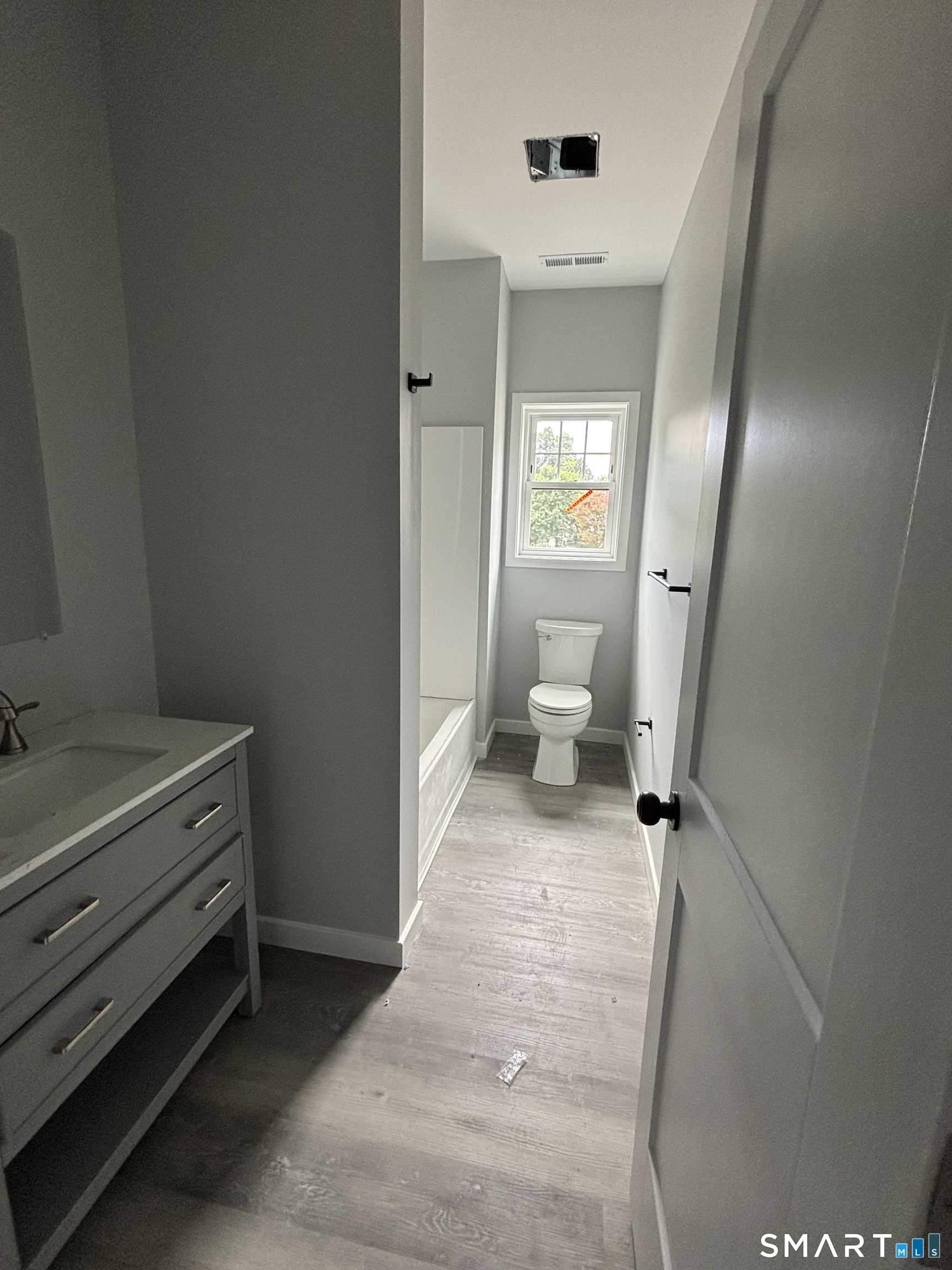 9 Putnam Park Road Bethel, CT 06801 - Photo 16 of 16 a bathroom with a sink and a toilet