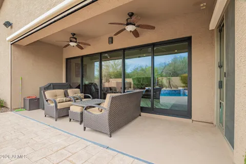 a view of a swimming pool with lounge chair