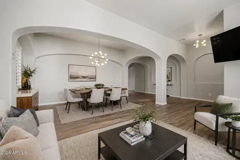 a living room with furniture and windows