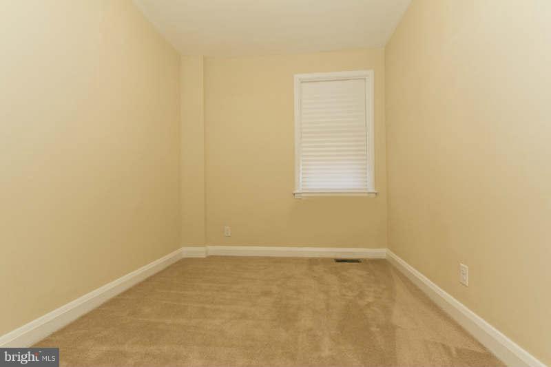4230 Colborne Road Baltimore, MD 21229 - Photo 22 of 27 an empty room with a window