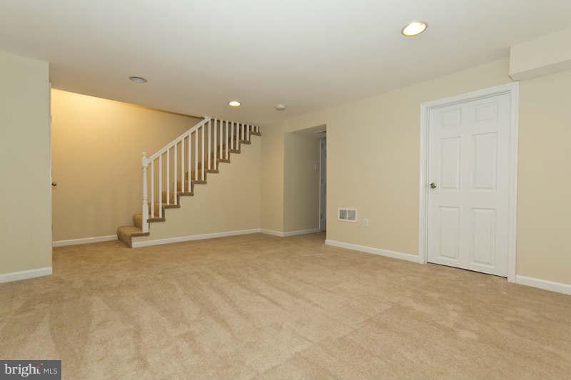4230 Colborne Road Baltimore, MD 21229 - Photo 8 of 27 a view of an empty room with stairs