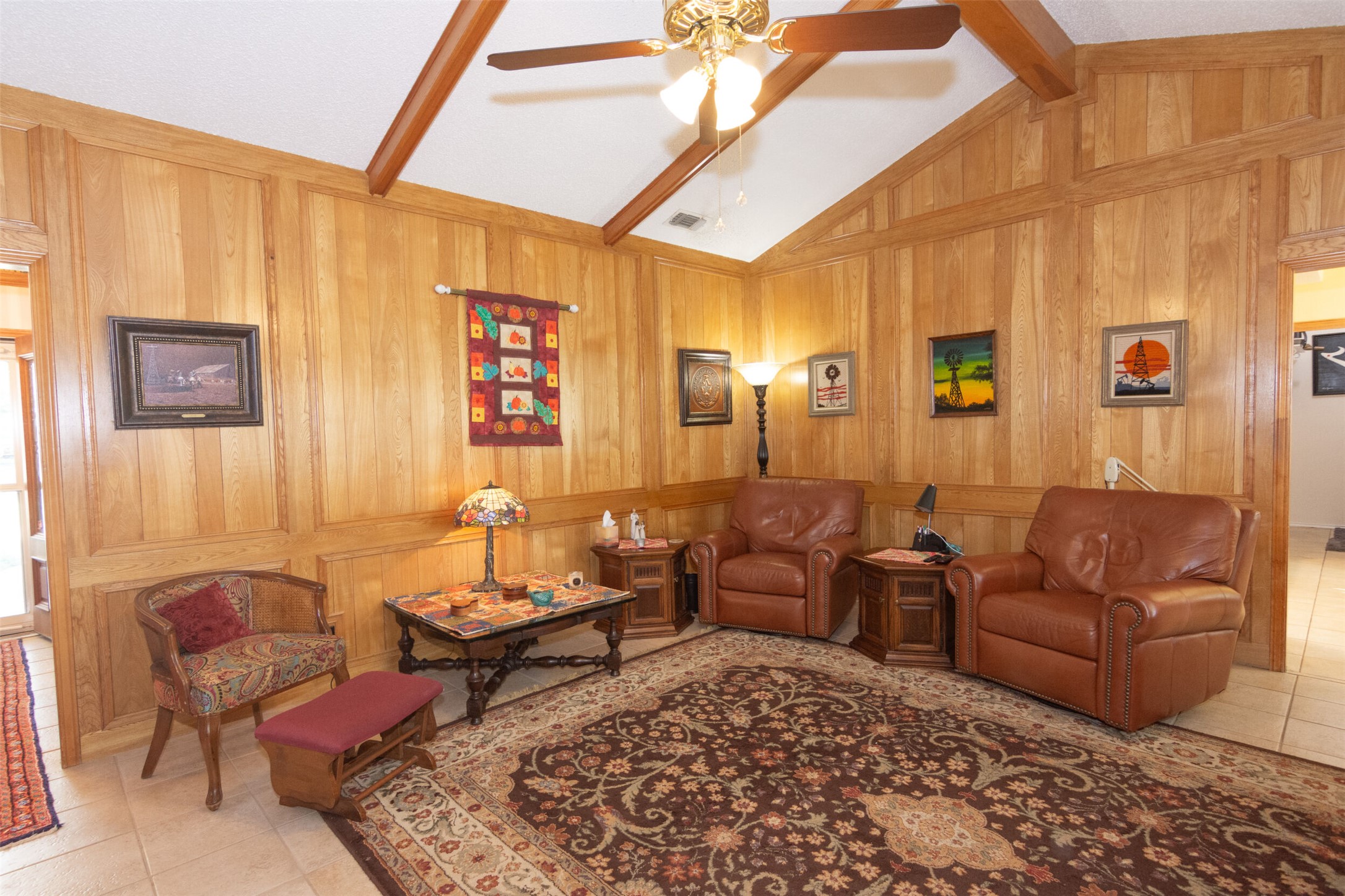 219 Turtle Bend Georgetown, TX 78628 - Photo 12 of 37 This rich paneling and beam ceiling create a warm Great rm.