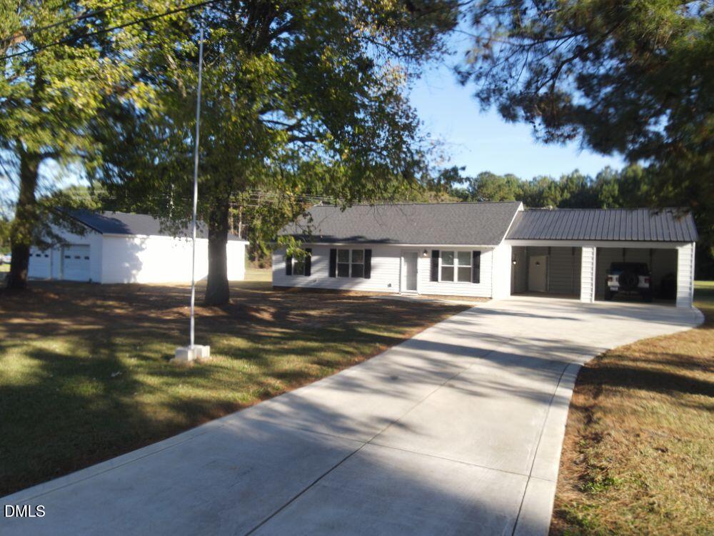 a house view with a swimming pool