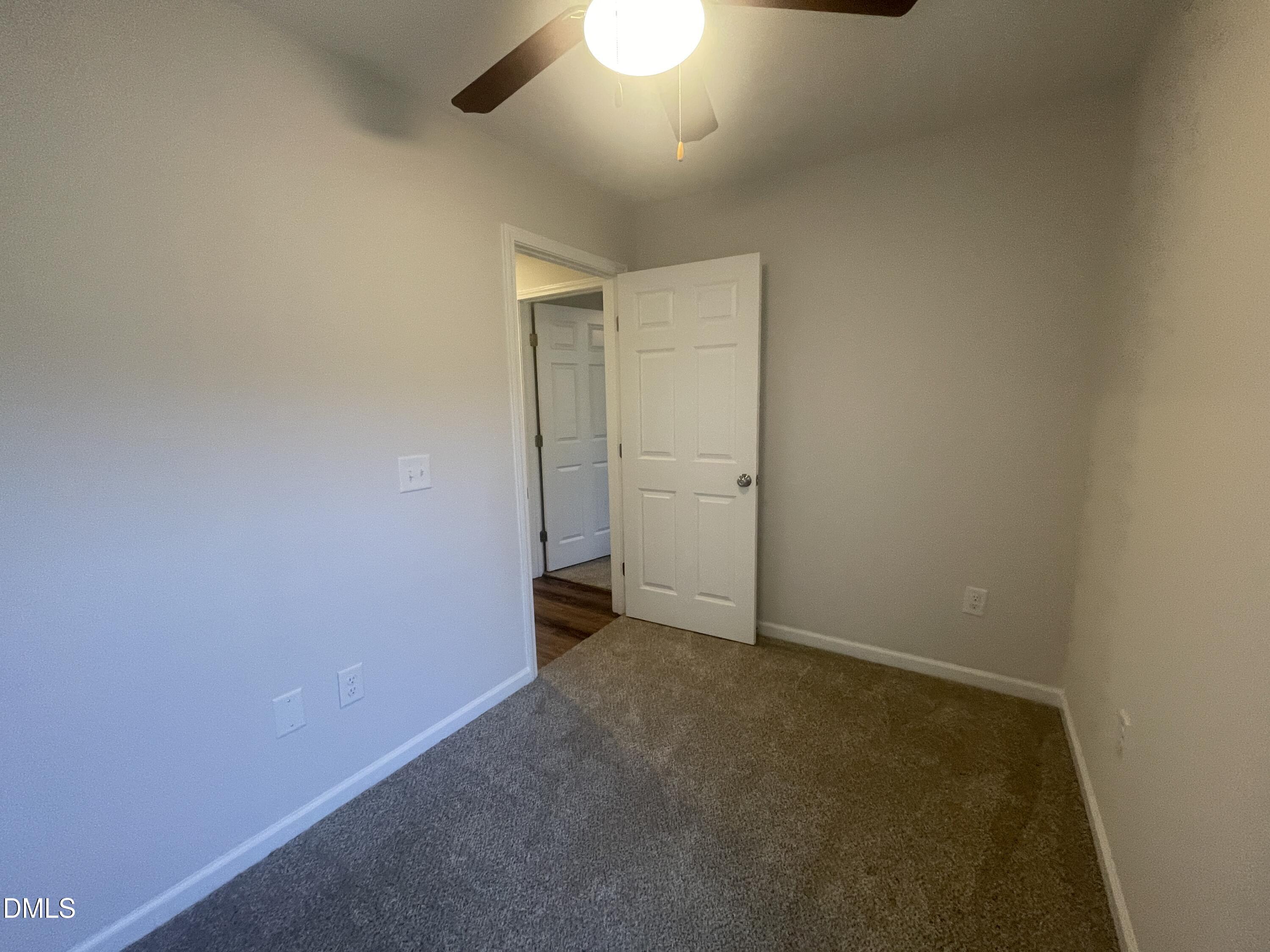 144 Red Hill Church Road Dunn, NC 28334 - Photo 16 of 44 an empty room with a bathroom