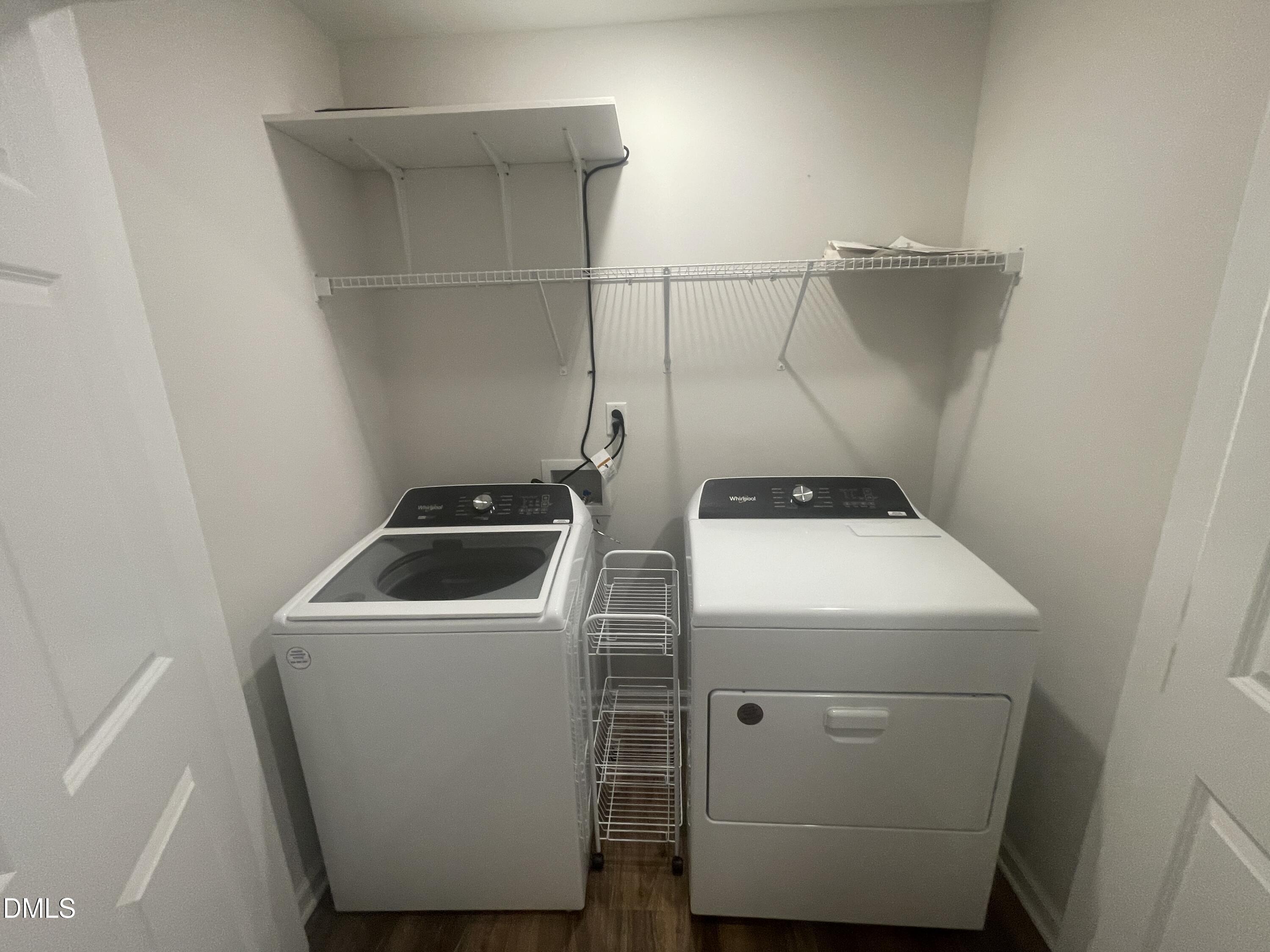 144 Red Hill Church Road Dunn, NC 28334 - Photo 24 of 44 a utility room with dryer and washer
