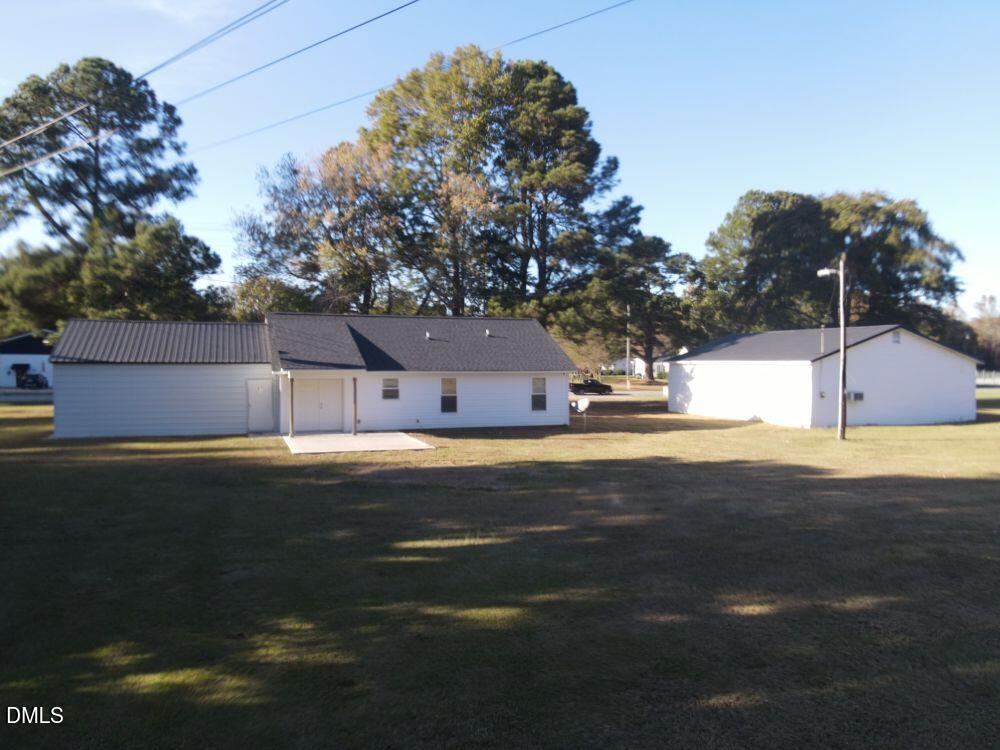 144 Red Hill Church Road Dunn, NC 28334 - Photo 5 of 44 a view of the house with a yard